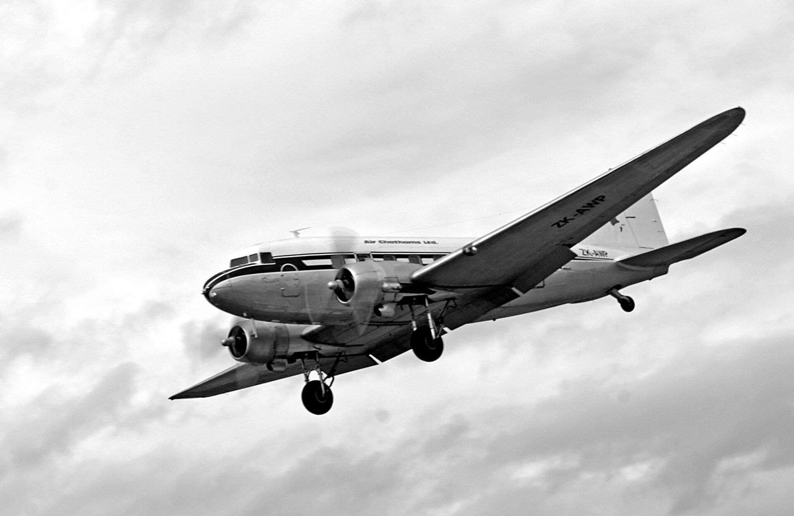 A preserved Douglas DC-3 airliner in flight.
